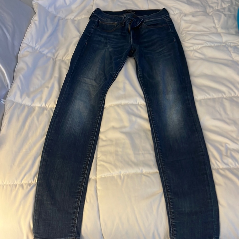 EXPRESS mid rise Jean- Legging. Size 2. Zipper front. Great condition. Med wash.